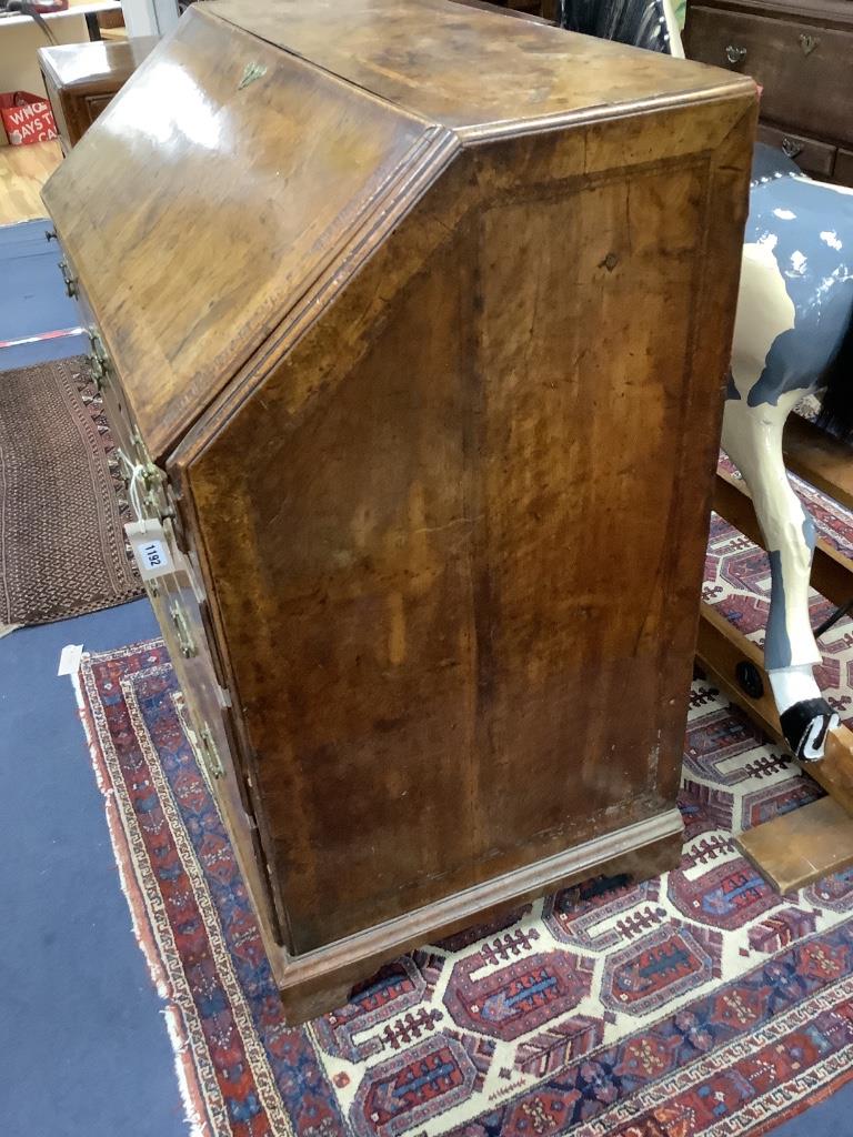 A George II walnut bureau, width 91cm depth 52cm height 97cm
